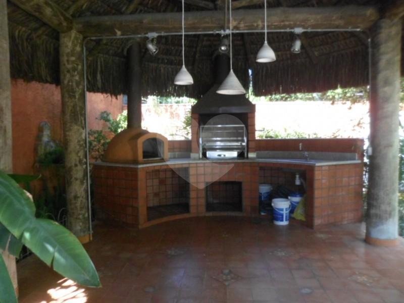 Casa à venda com 4 suítes no condomínio Jardim das Azaléias, São Paulo - SP
