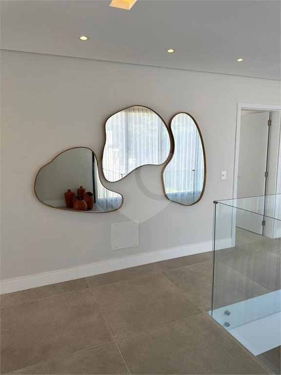 Casa à venda com 6 suítes no condomínio Golf CL, Bertioga - SP