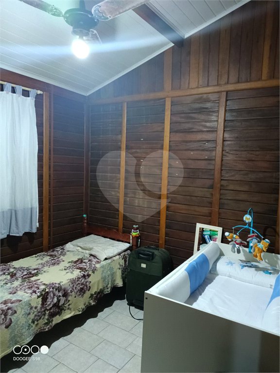 Casa à venda com 4 quartos, sendo 1 suíte,  no condomínio Morada da Praia, Bertioga - SP