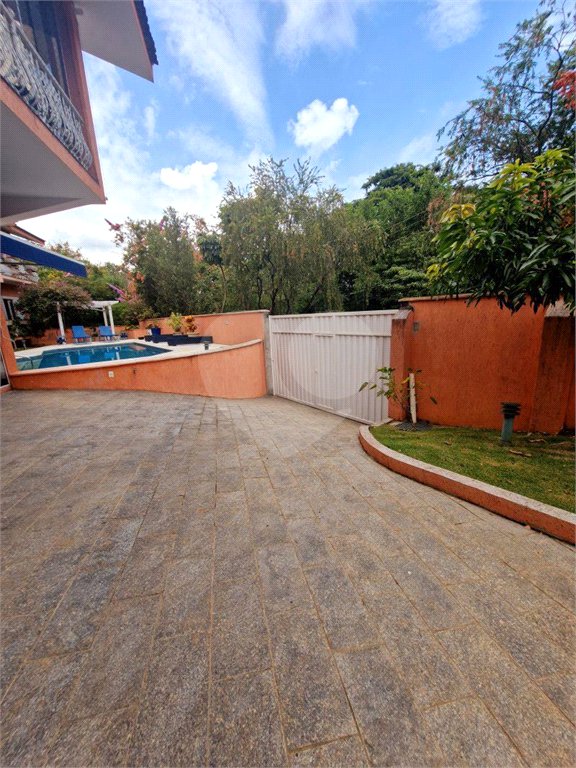 Casa à venda com 4 suítes no condomínio Estância Marambaia, Vinhedo - SP