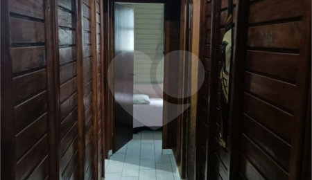 Casa à venda com 4 quartos, sendo 1 suíte, no condomínio Morada da Praia, Bertioga - SP