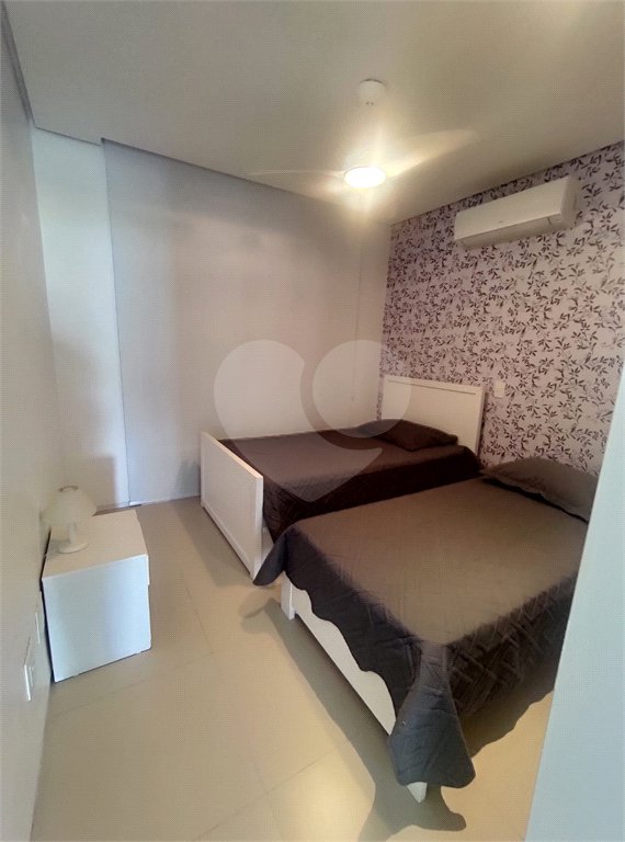 Casa à venda ou para alugar com 4 suítes no condomínio Sambaqui, São Sebastião - SP