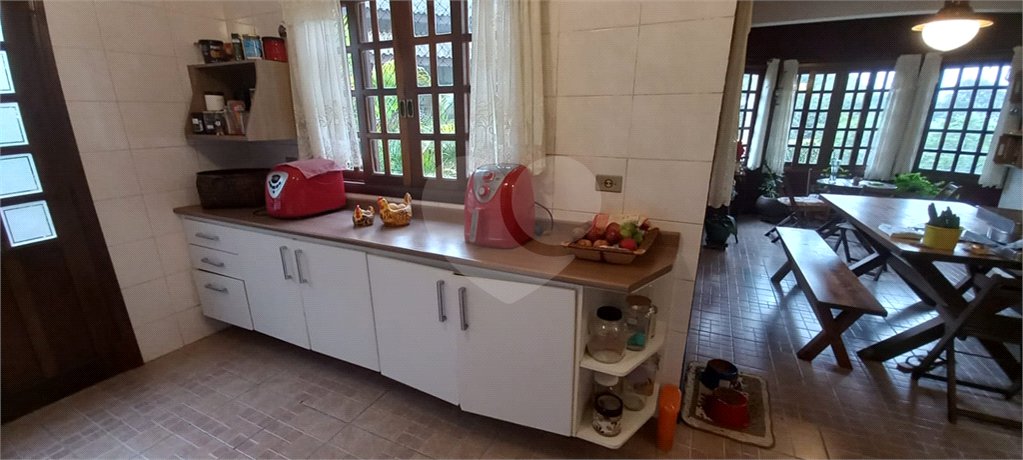 Casa à venda com 4 suítes no condomínio Alpes da Cantareira, Mairiporã - SP