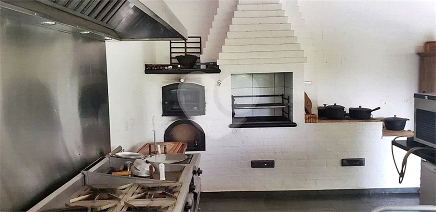 Casa à venda com 4 suítes no condomínio Alpes da Cantareira, Mairiporã - SP