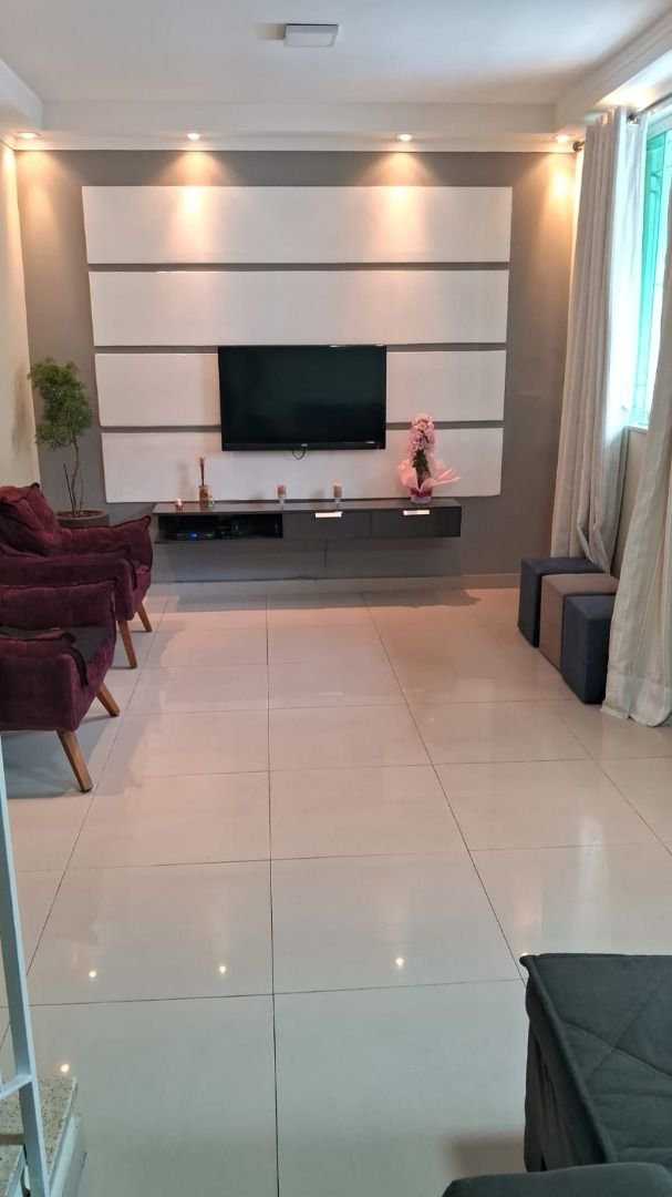 Sobrado com 3 dormitórios à venda, 150 m² por R$ 780.000,00 - Estuário - Santos/SP