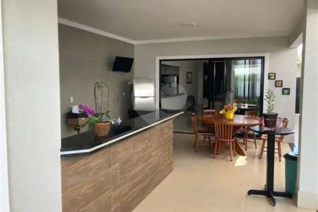 Casa à venda com 3 suítes no condomínio Terras do Cancioneiro, Paulínia - SP