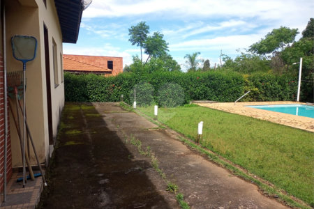 Casa à venda com 4 quartos, sendo 1 suíte,  no condomínio Village da Serra, Araçoiaba da Serra - SP