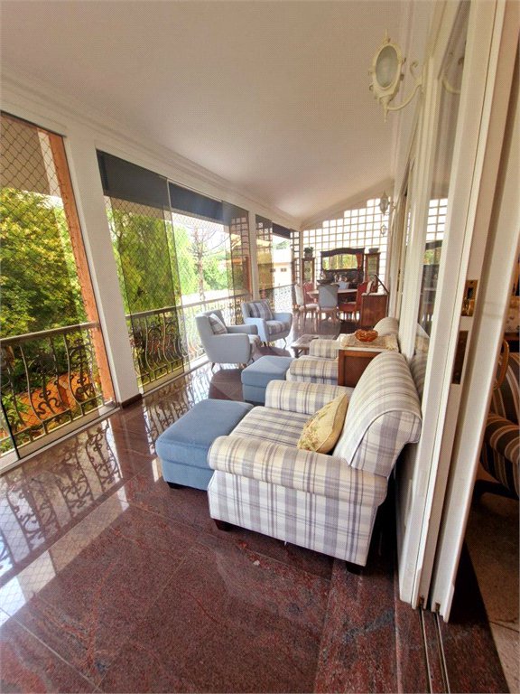 Casa à venda com 4 suítes no condomínio Estância Marambaia, Vinhedo - SP