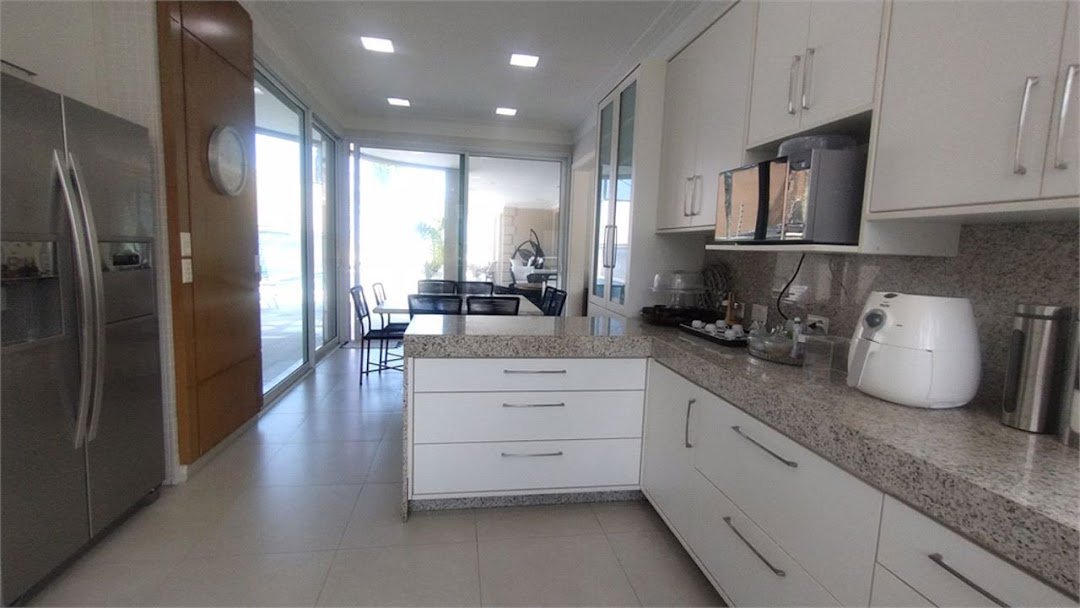 Casa com 6 dormitórios à venda, 700 m² por R$ 10.000.000,00 - Loteamento João Batista Julião - Guarujá/SP