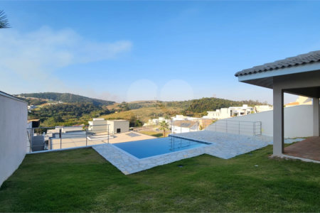 Casa à venda com 4 suítes no condomínio Santa Isabel I, Louveira - SP