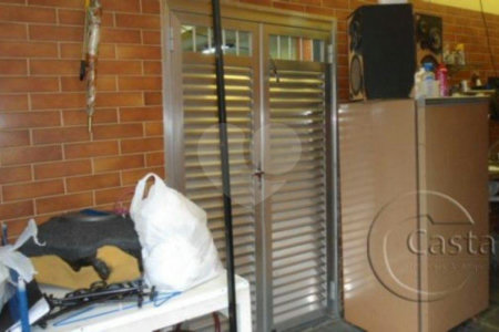 Casa térrea com salas comerciais em anexo à venda na região da Moóca