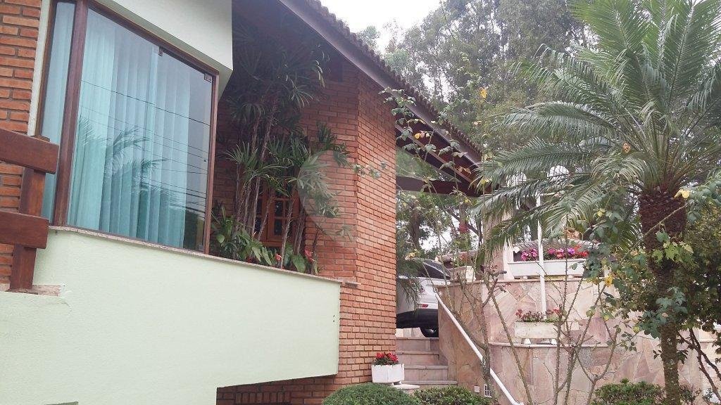 CASA TÉRREA A VENDA NO TREMEMBÉ - 4 SUÍTES E 10 VAGAS DE GARAGEM