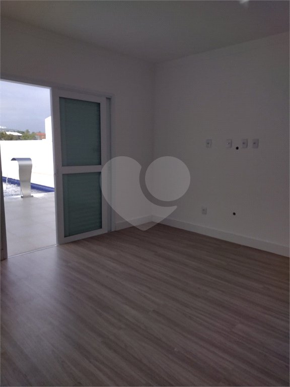 Casa à venda com 4 suítes no condomínio Estância Marambaia, Vinhedo - SP