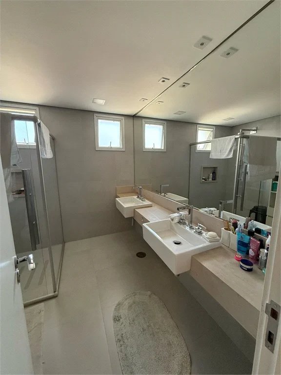 Casa à venda com 4 suítes no condomínio East Village, São Paulo - SP
