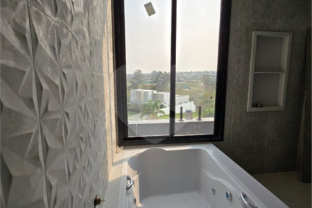 Casa à venda com 4 quartos, sendo 3 suítes, no condomínio Alphaville Nova Esplanada 4, Votorantim - SP