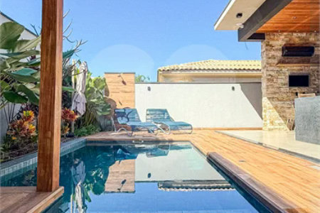 Indaiatuba - HOME DESIGN - Casa Térrea - Condomínio Paradiso - 420 m² de terreno - 307,19 m² de área construída - 3 suítes completas, sendo 1 master com closet planejado e banheira de imersão - Sala de TV reversível para 4ª suíte - Sala de estar ampla e varanda gourmet integrada - Cozinha com móve