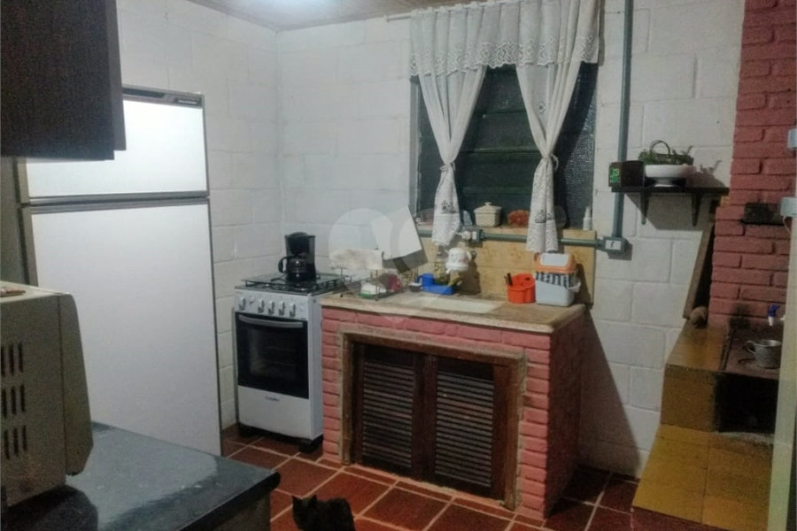 Casa à venda com 3 quartos, sendo 1 suíte, no condomínio Cinco Lagos, Mairiporã - SP
