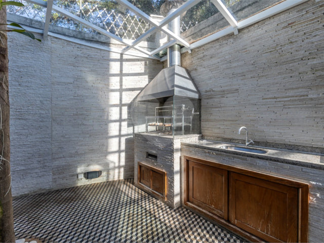 Casa à venda com 4 suítes no condomínio Saint Germain, São Paulo - SP