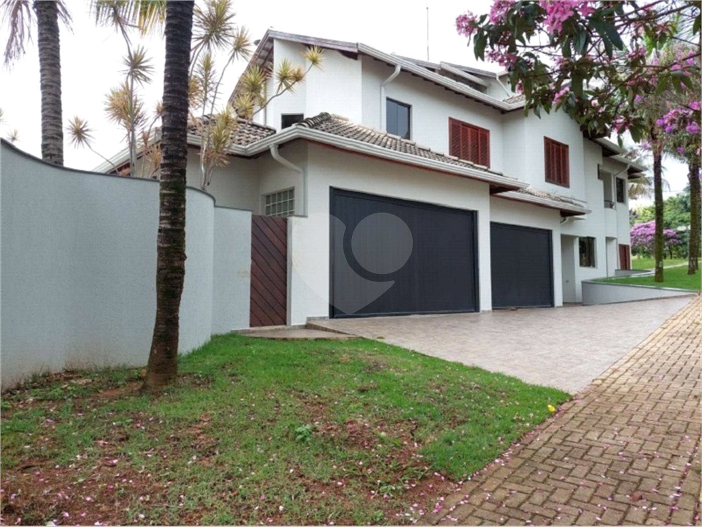 Casa à venda com 4 suítes no condomínio Reserva Colonial, Valinhos - SP