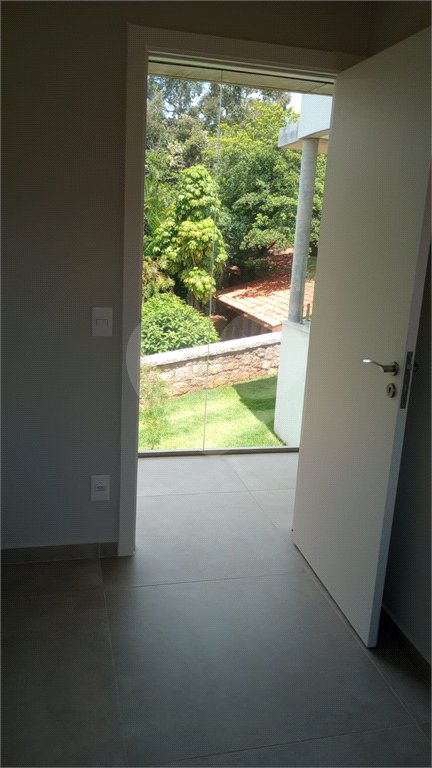 Casa à venda com 4 suítes no condomínio Estância Marambaia, Vinhedo - SP