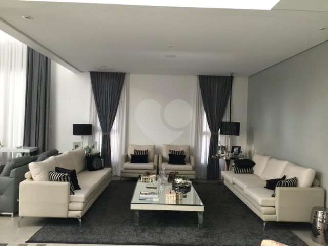 Casa à venda com 4 suítes no condomínio Suíça da Cantareira, Mairiporã - SP