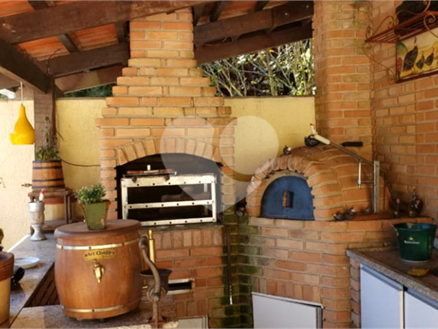 Casa à venda com 4 suítes no condomínio Alpes da Cantareira, Mairiporã - SP