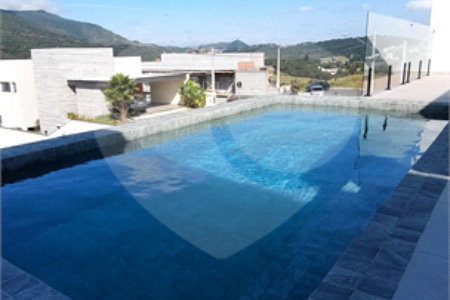 Casa à venda com 3 suítes no condomínio Greenfield, Atibaia - SP