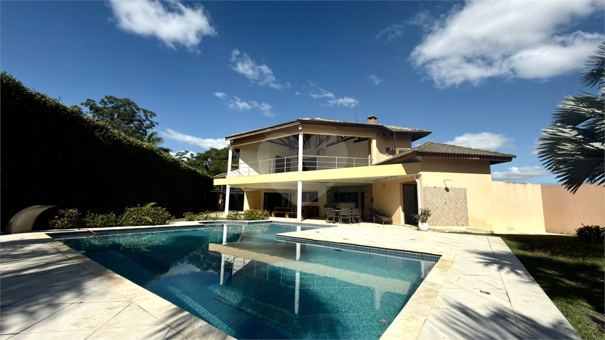 Casa à venda com 4 suítes no condomínio Parque Village Castelo, Itu - SP