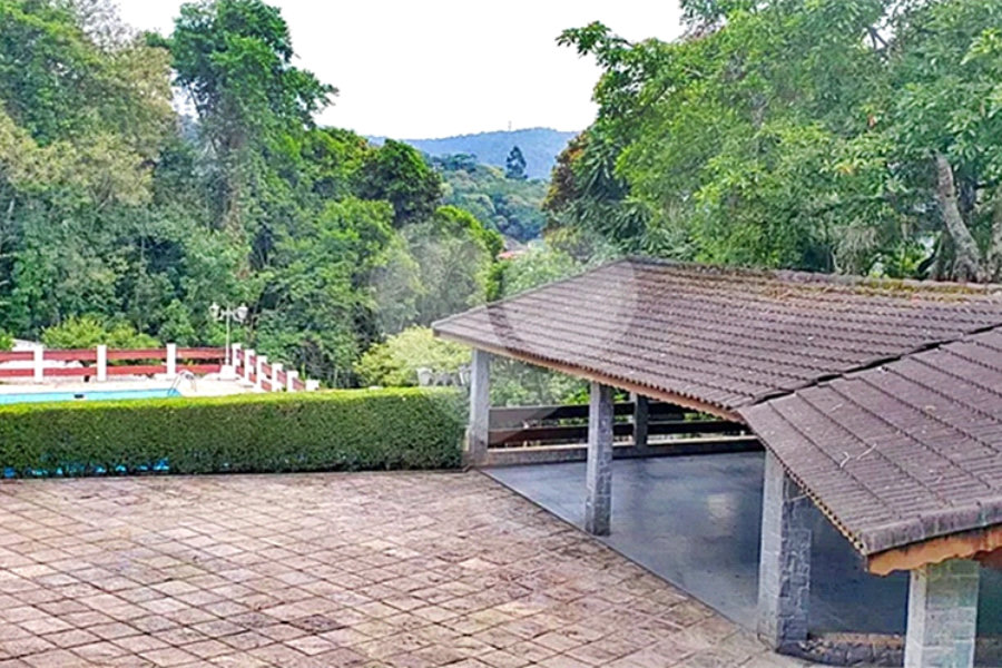 Casa à venda com 4 suítes no condomínio Alpes da Cantareira, Mairiporã - SP