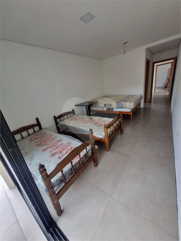 Casa à venda com 4 suítes no condomínio Park Lane, Guarujá - SP