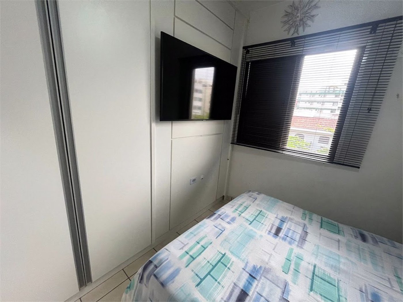 Apartamento com 2 dormitórios à venda, 64 m² por R$ 360.000,00 - Jardim Praiano - Guarujá/SP