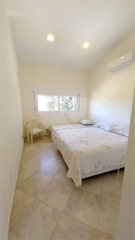 Casa à venda com 3 suítes no condomínio Residencial Parque Arco-íris, Atibaia - SP
