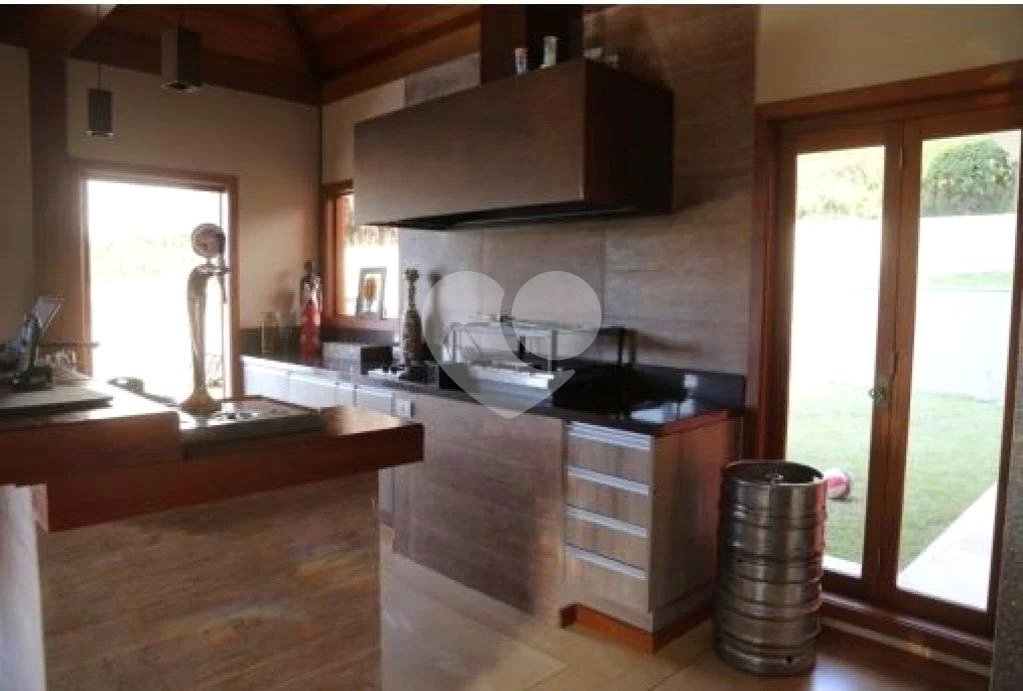 Casa à venda com 4 suítes no condomínio Suíça da Cantareira, Mairiporã - SP