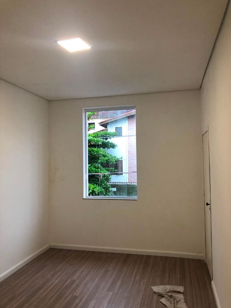 Casa com 3 dormitórios à venda, 116 m² por R$ 690.000,00 - Gonzaga - Santos/SP