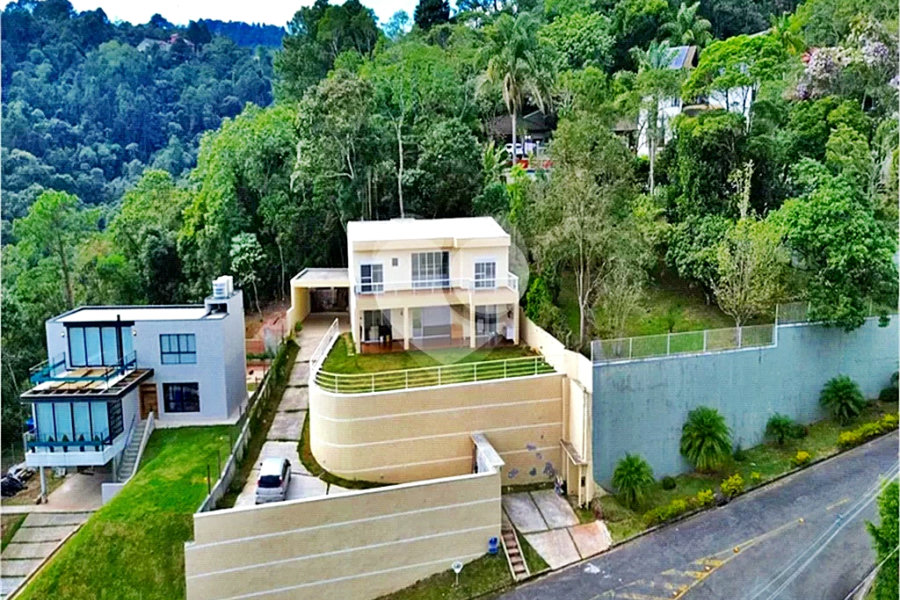 Casa à venda com 4 suítes no condomínio Alpes da Cantareira, Mairiporã - SP