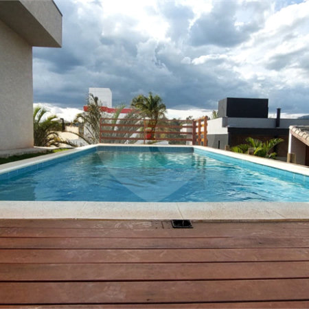 Casa à venda com 4 suítes no condomínio Figueira Garden, Atibaia - SP