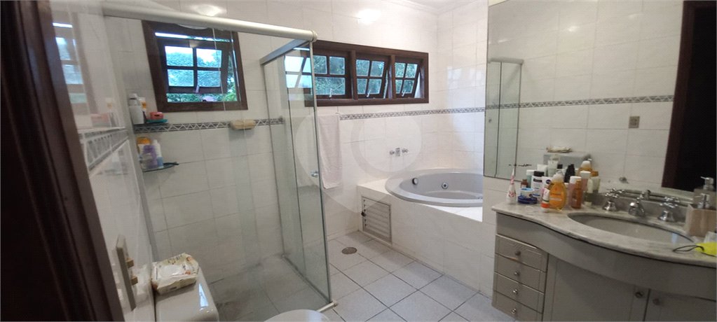 Casa à venda com 4 suítes no condomínio Alpes da Cantareira, Mairiporã - SP