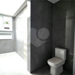 Casa à venda com 4 suítes no condomínio Vila Arese, São Paulo - SP