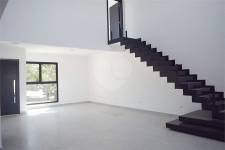 Casa à venda com 4 suítes no condomínio Figueira Garden, Atibaia - SP