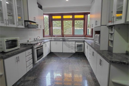 Casa à venda com 4 suítes no condomínio Ville Bourghese, São Paulo - SP