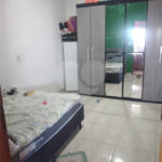 Sobrado 3 quartos e área comercial em baixo.