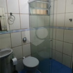 Casa à venda com 4 quartos, sendo 1 suíte,  no condomínio Morada da Praia, Bertioga - SP