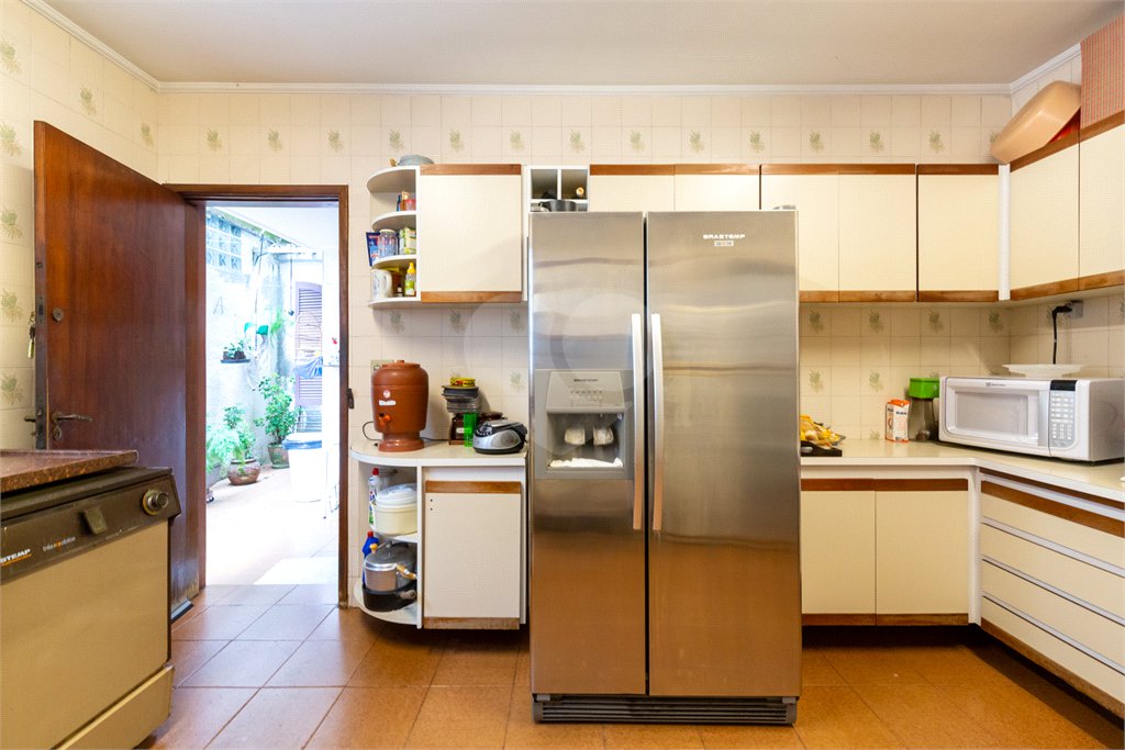 Casa à venda com 4 quartos, sendo 2 suítes, em Campo Belo, São Paulo, SP