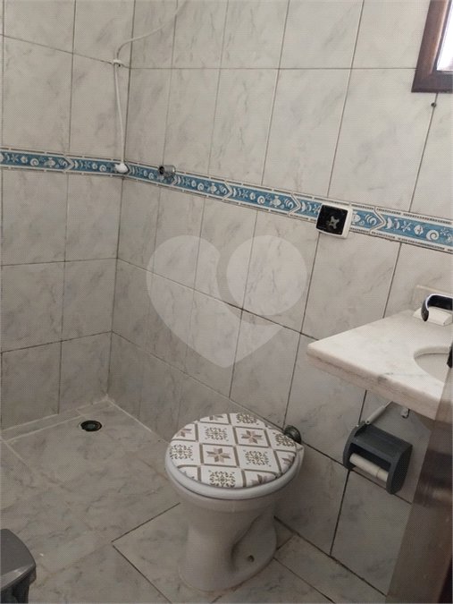 Casa à venda com 2 suítes, no condomínio Residencial Vitória Régia, Bertioga - SP