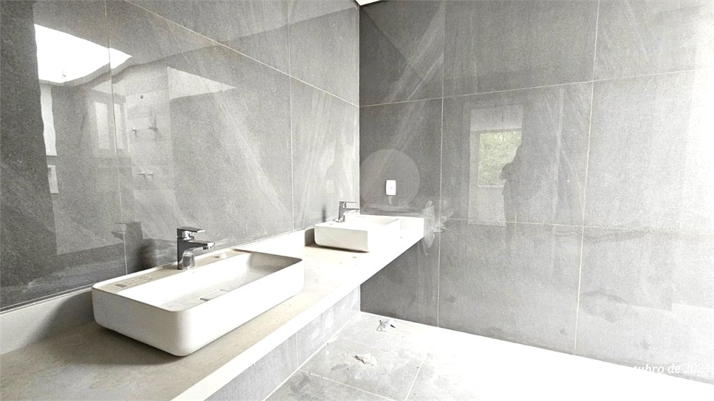 Casa à venda com 4 suítes no condomínio Vila Arese, São Paulo - SP