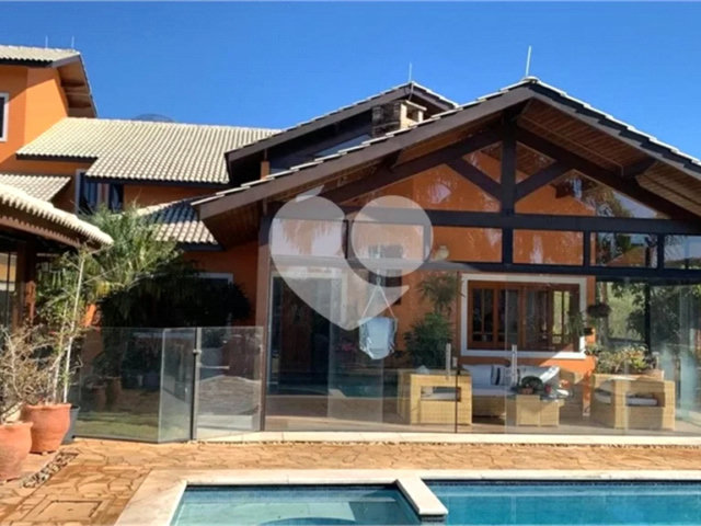 Casa à venda com 4 suítes no condomínio Suíça da Cantareira, Mairiporã - SP