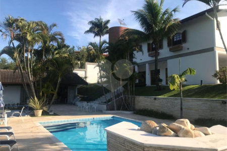 Casa à venda com 4 suítes no condomínio Parque da Fazenda, Itatiba - SP