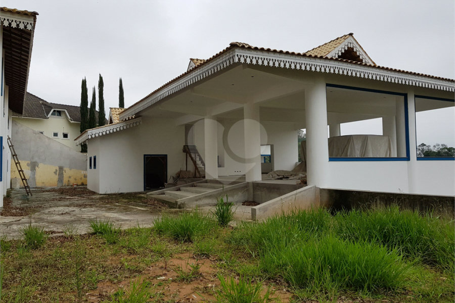 Casa à venda com 4 suítes no condomínio Suíça da Cantareira, Mairiporã - SP