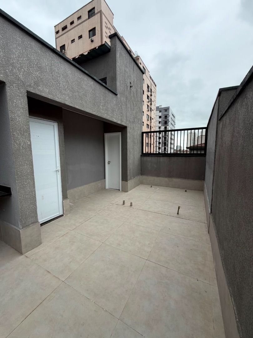 Casa com 2 dormitórios à venda, 116 m² por R$ 650.000,00 - Marapé - Santos/SP