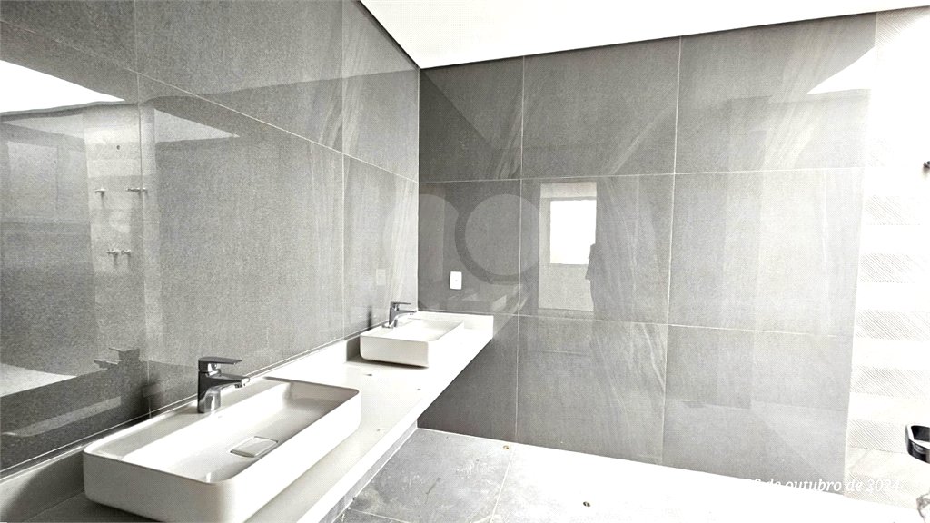 Casa à venda com 4 suítes no condomínio Vila Arese, São Paulo - SP
